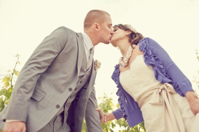 bride wearing a violet color cardigan